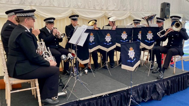 South Yorkshire Police Brass ensemble on stage at Firth Hall, Sheffield University